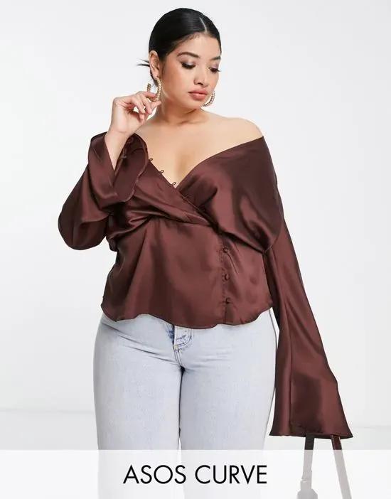 ASOS DESIGN Curve drape long sleeve top with button keyhole detail and peplum hem in chocolate