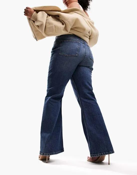 ASOS DESIGN Curve flared jeans in dark blue