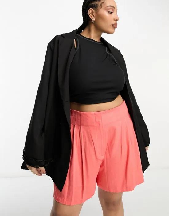 ASOS DESIGN Curve linen seamed waist shorts in coral