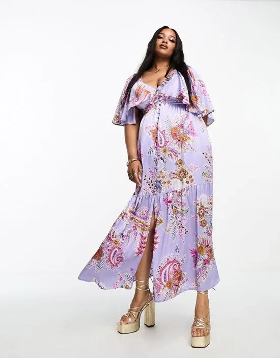 ASOS DESIGN Curve satin flutter sleeve v-neck maxi dress with tier hem in lilac paisley print
