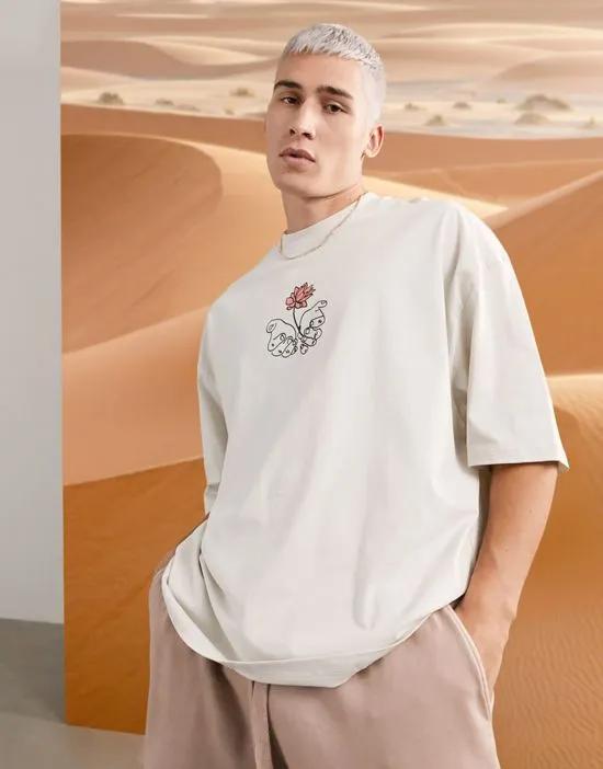 ASOS DESIGN oversized t-shirt in beige with hand drawing
