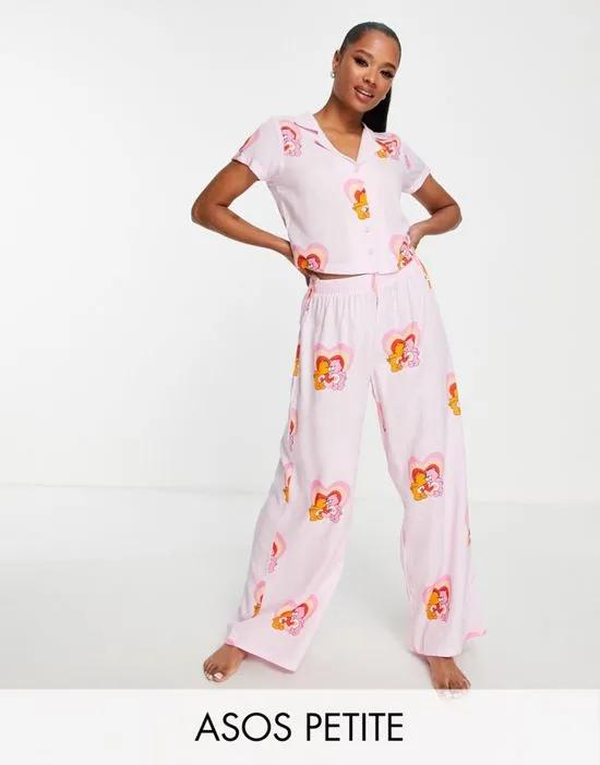 ASOS DESIGN Petite Care Bears modal shirt & pants pajama set in pink