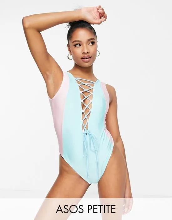 ASOS DESIGN Petite color block lace up swimsuit in blue and pink