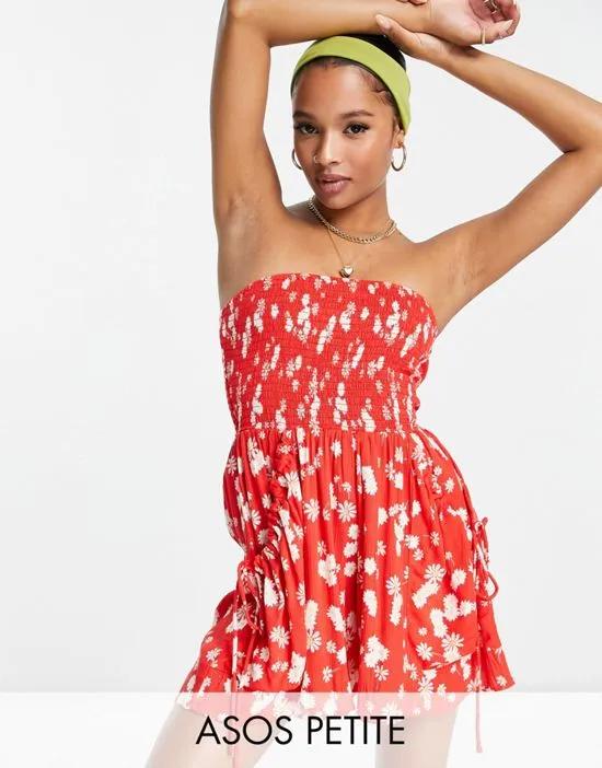 ASOS DESIGN Petite crinkle rayon strapless slouchy romper in red ditsy daisy