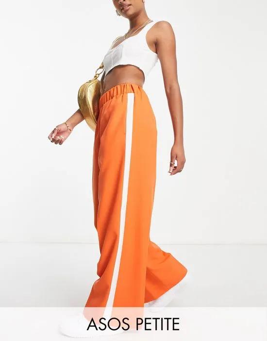ASOS DESIGN Petite elastic waist tailored pants in amber with ivory side stripe