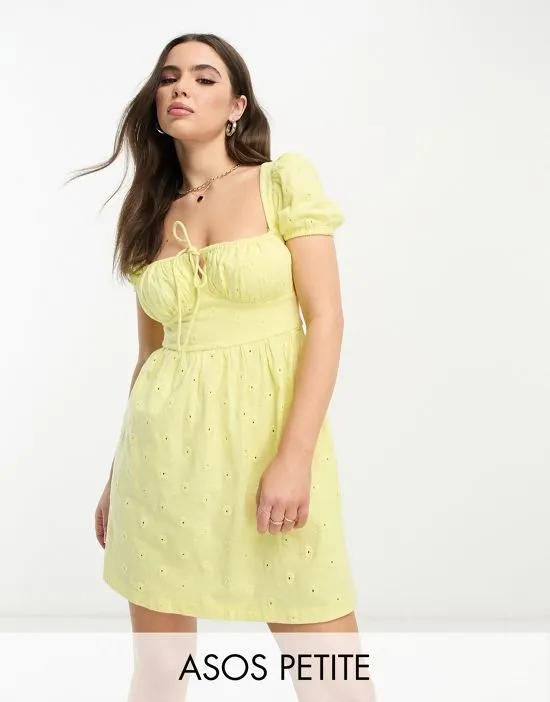 ASOS DESIGN Petite eyelet short sleeve mini tea dress with ruched bust in lemon