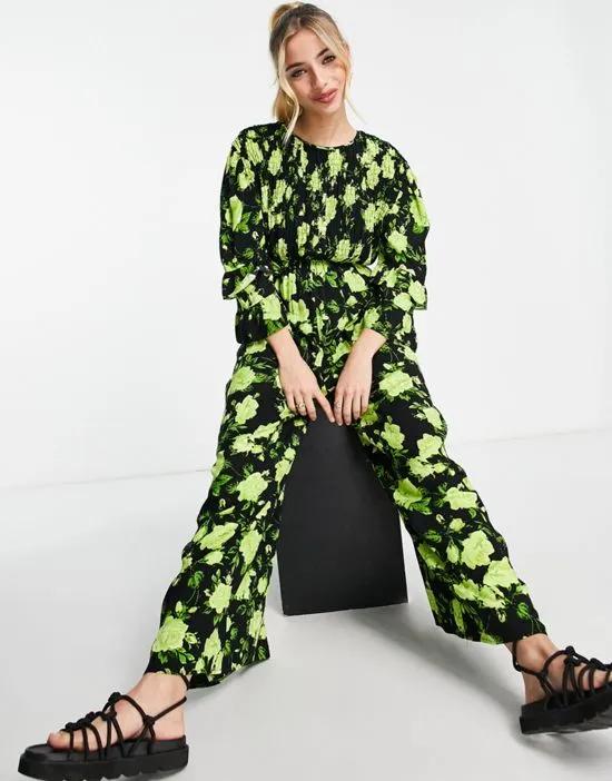 ASOS DESIGN shirred smock jumpsuit in neon green floral