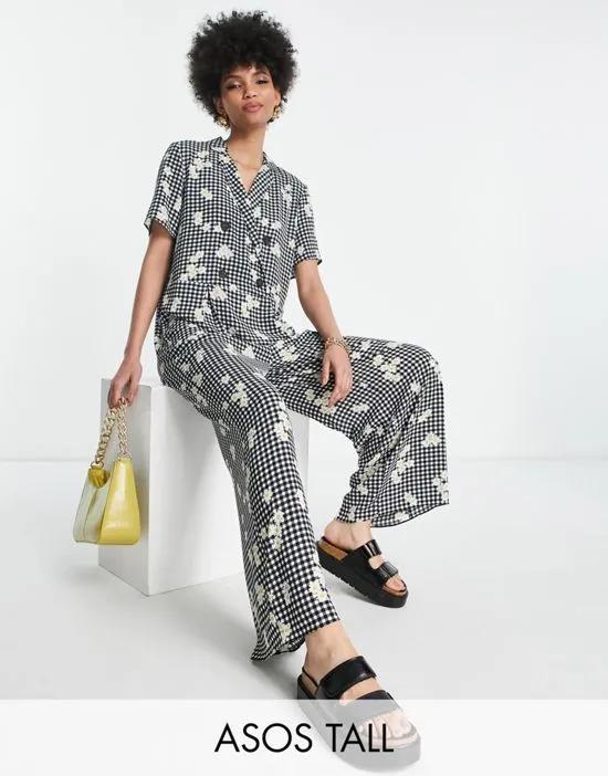 ASOS DESIGN Tall bubble crepe double breasted smock jumpsuit in gingham floral