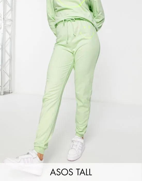 ASOS DESIGN Tall lounge Smiley sweatpants in lime - part of a set