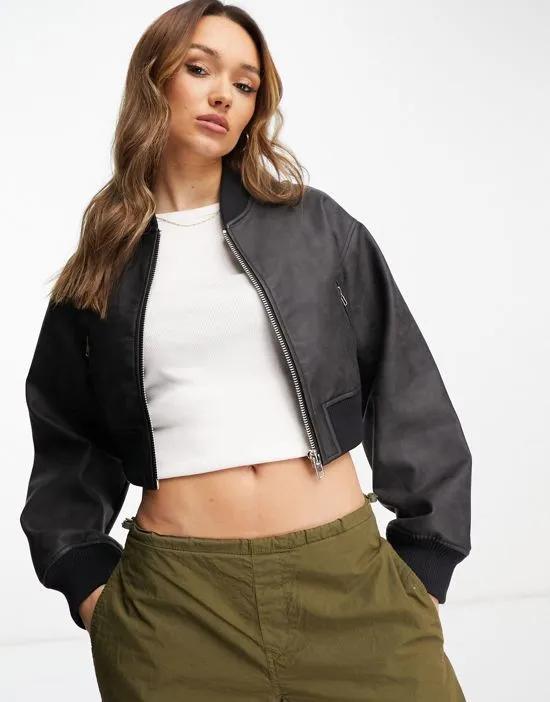 ASOS DESIGN washed faux leather cropped bomber jacket in black