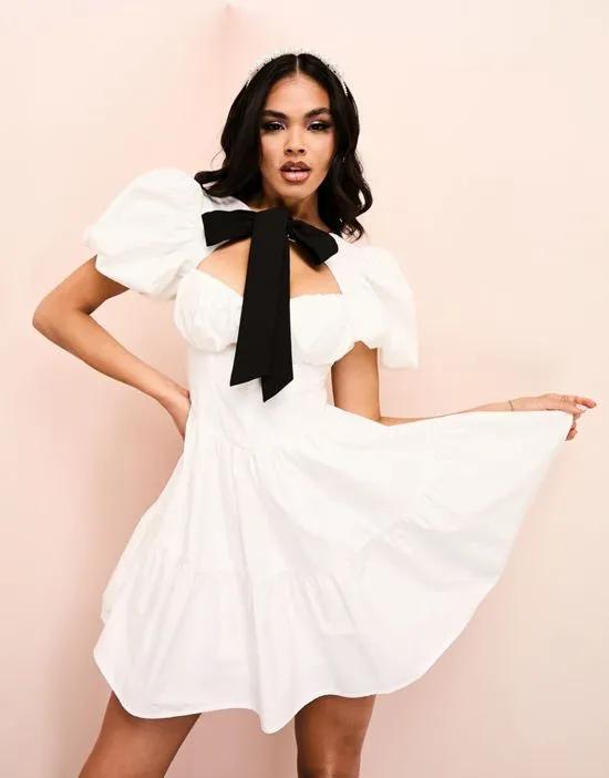 ASOS LUXE corsetted poplin tiered mini dress with contrast bow and puff sleeve in white