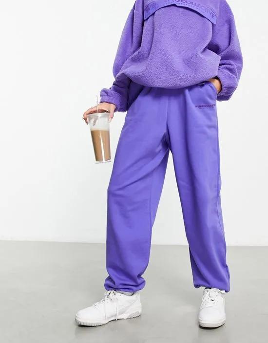 ASOS Weekend Collective oversized sweatpants in purple