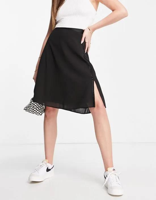 audeta drape mini skirt in black