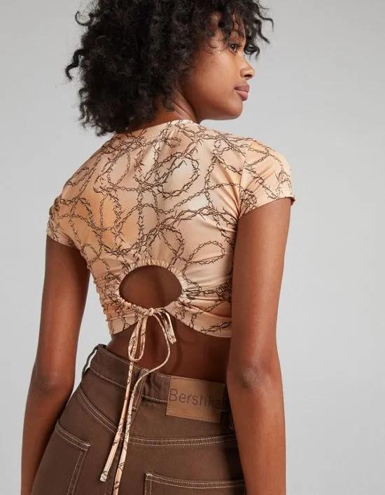 back detail crop top in orange chain print