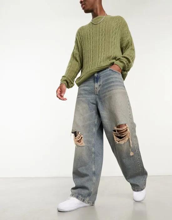 baggy jeans with yellow casting wash in blue