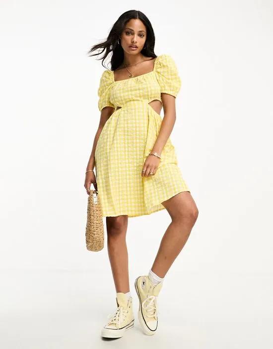 balloon sleeve cut out mini dress in yellow gingham