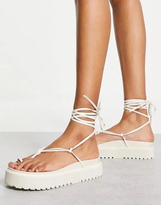 Bebe flatform sandals with ankle tie in white