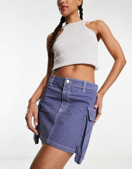 Bellow pocket mini skirt in navy with white stitch