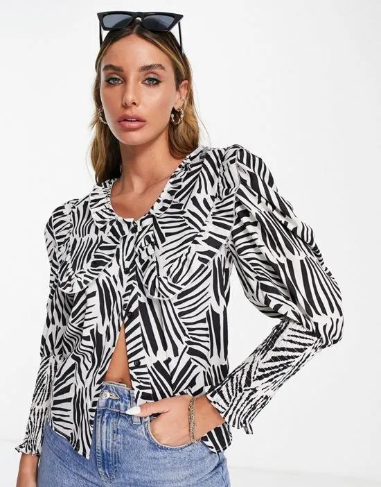 blouse with oversized collar in abstract zebra print