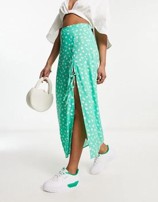 bow detail midi skirt with thigh split in green ditsy floral