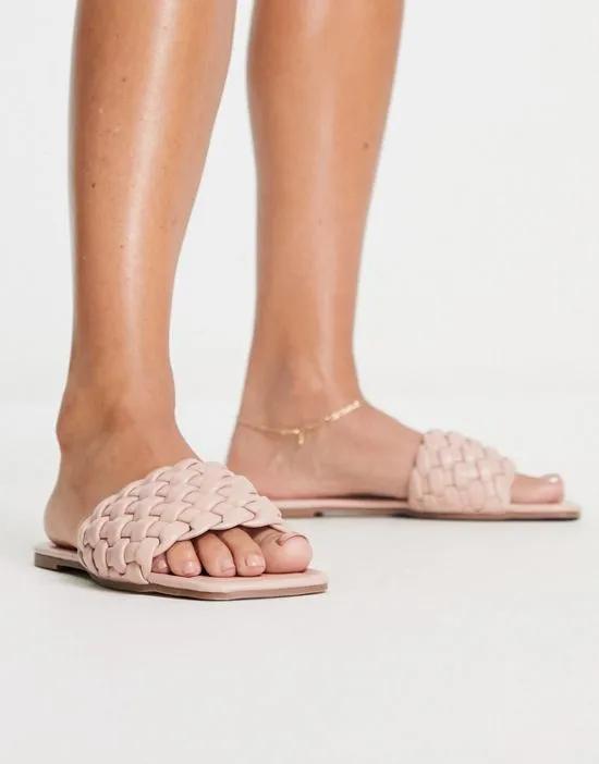 braided flat sandals in beige