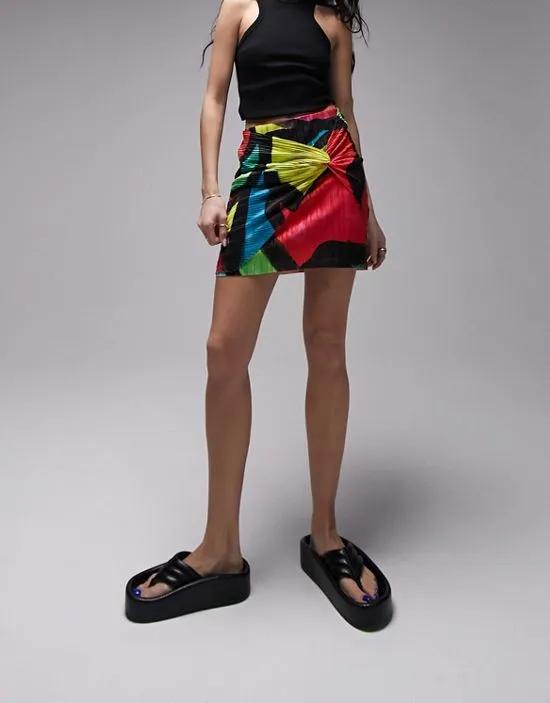 bright graffiti plisse wrap mini skirt in multi