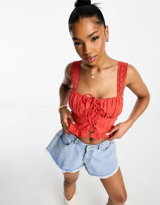 broderie tank top with lace up front in red