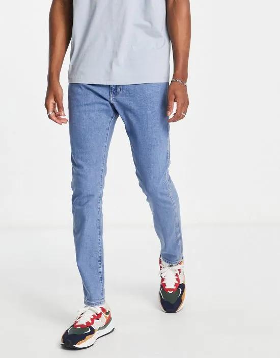 Bryson skinny jeans in mid blue
