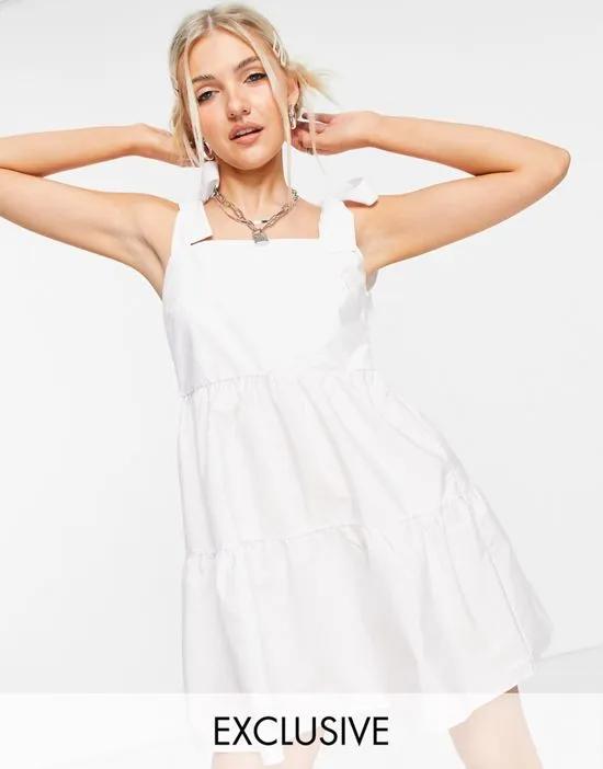 bunny strap mini dress in white