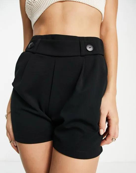 button detail tailored shorts in black