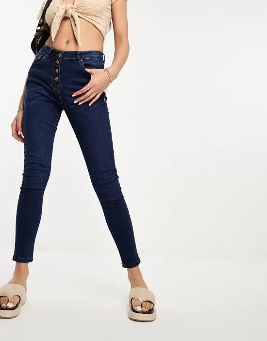 button front high rise skinny jeans in dark blue