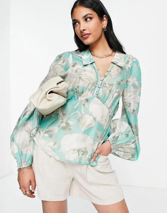 button loop plunge shirt with open back in sage green floral