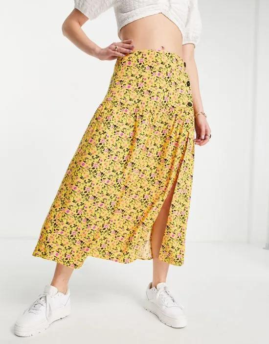 button side midi skirt in yellow ditsy floral