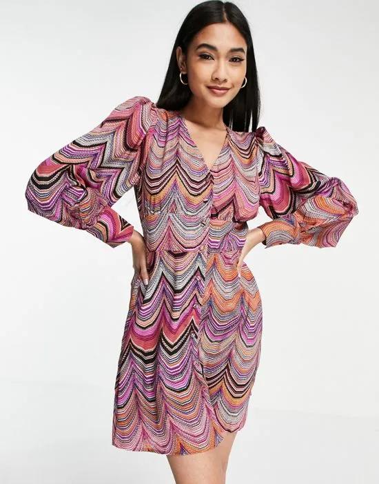 button through mini dress with fluted hem in swirl print