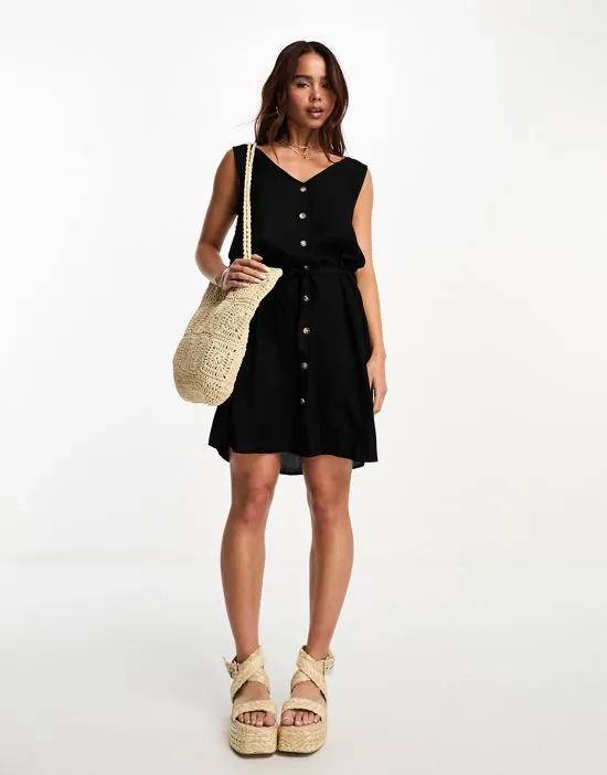 button through sleeveless mini dress in black