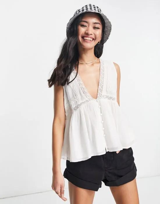 button through smock tank top with lace insert in white
