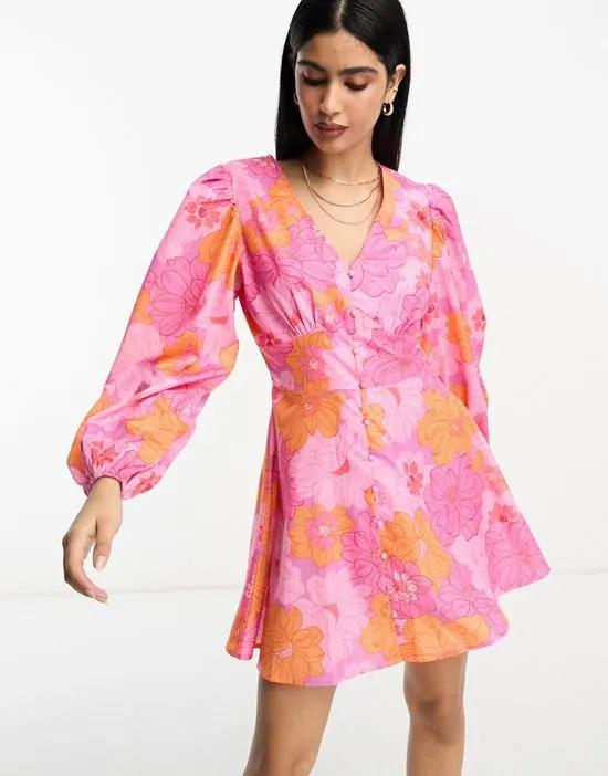 button through volume sleeve mini skater dress in pink floral