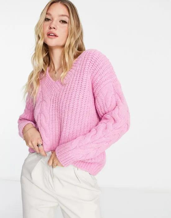 cable knit sweater in bright pink
