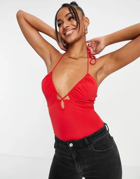 cami bodysuit with cut out in red