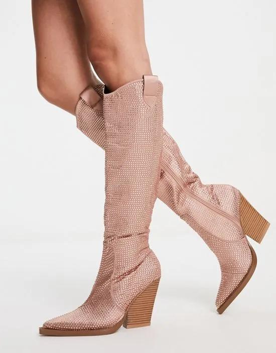 Catapult heeled western knee boots in rose gold rhinestones