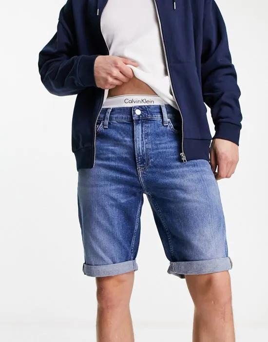 cc slim denim shorts in mid wash blue