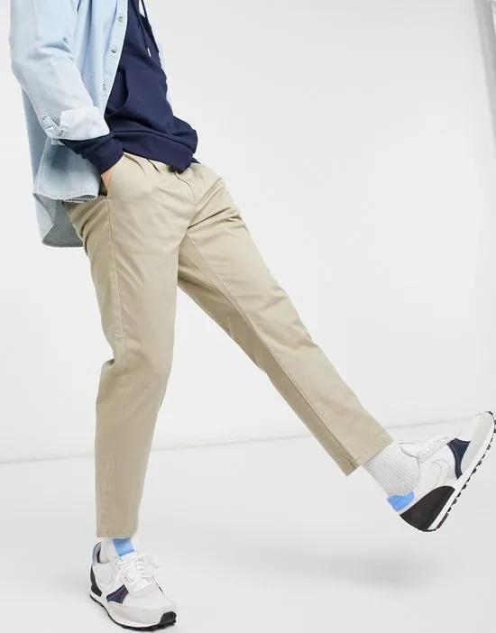 chinos in slim fit cropped stone