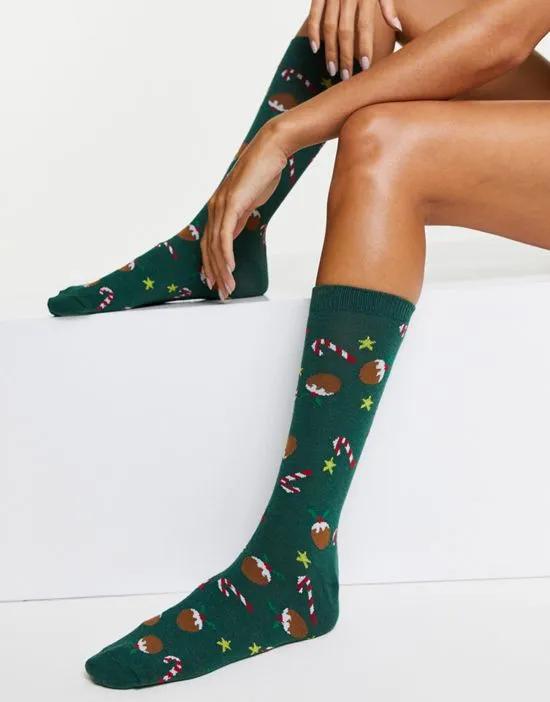 Christmas calf length socks in candy cane print in green