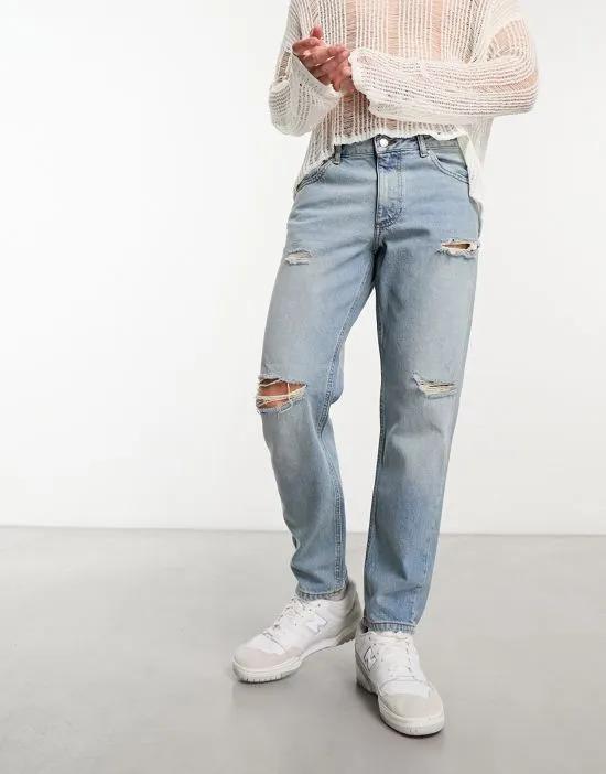classic rigid jeans with rips in mid blue