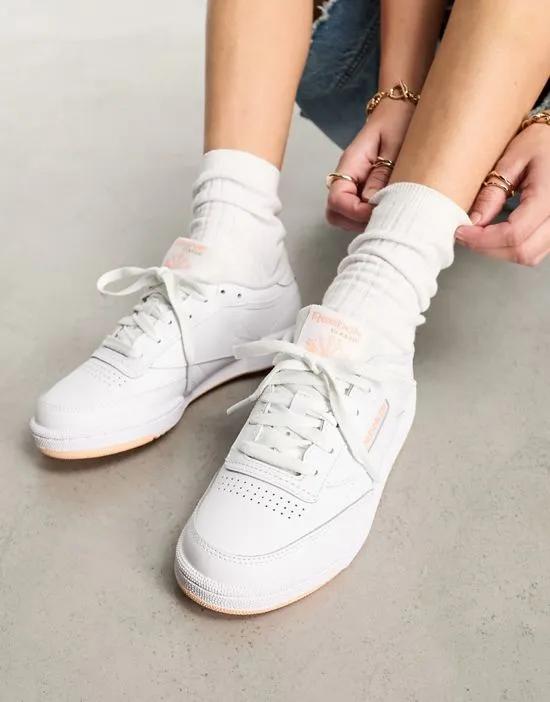 Club C 85 sneakers in white with peach detail