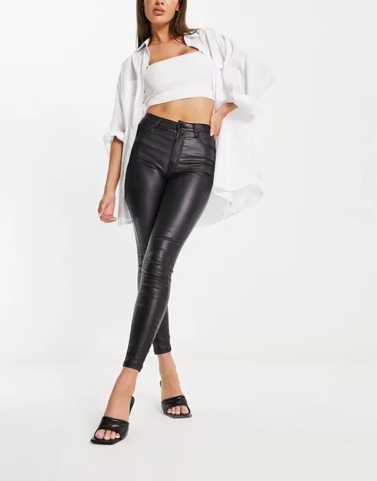 coated skinny jean in black