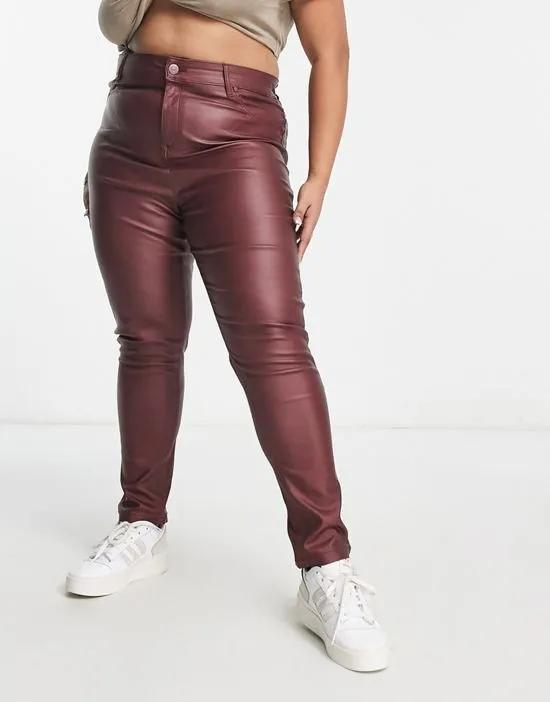 coated skinny jean in burgundy