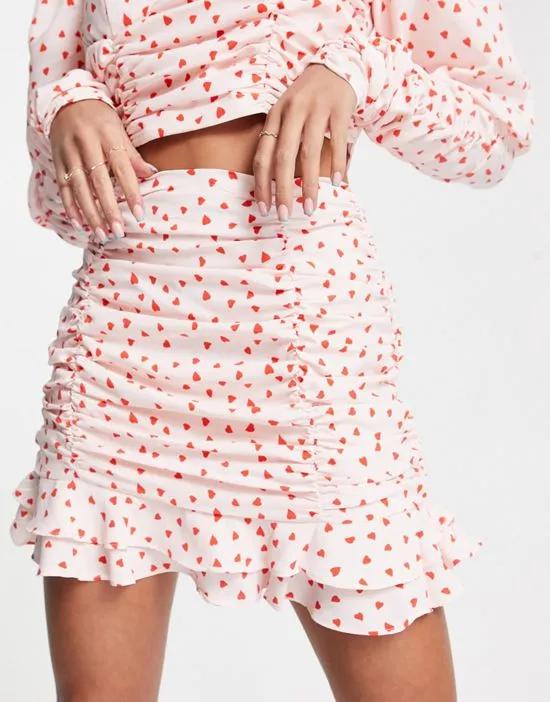 Collective the Label exclusive ruched frill mini skirt in heart print - part of a set