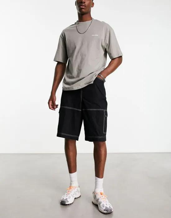 COLLUSION contrast stitch baggy skater shorts in black
