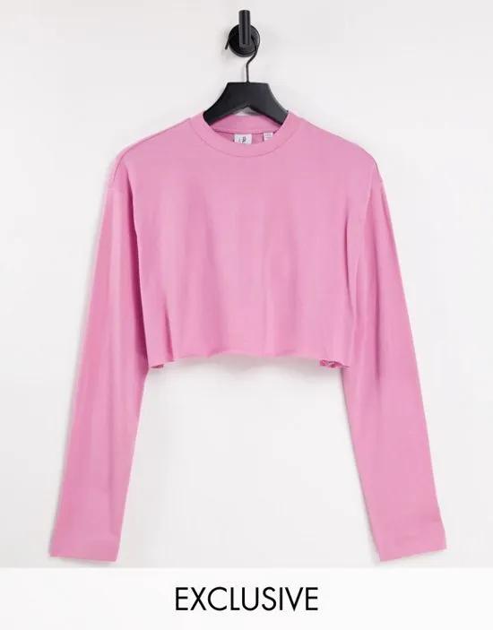 COLLUSION cotton raw hem crop long sleeve t-shirt in pink - ORANGE